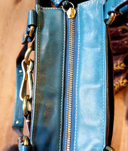 turquoise coach purse leather