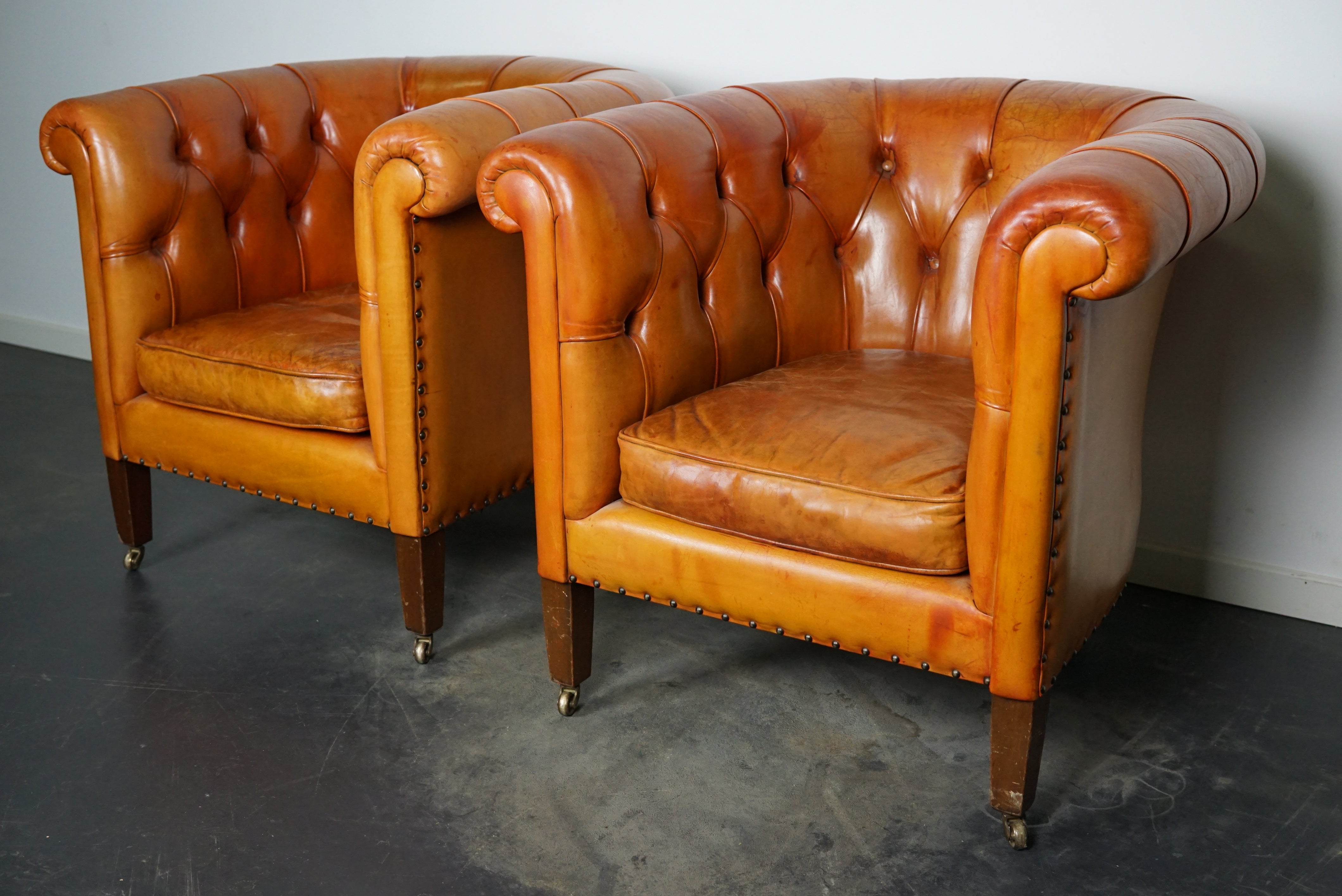 2 leather club chairs