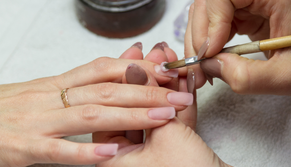 What Are Dip Powder Nails? The Cost, Risks, and Benefits for 2024