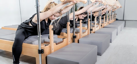group class done in a Pilates equipment