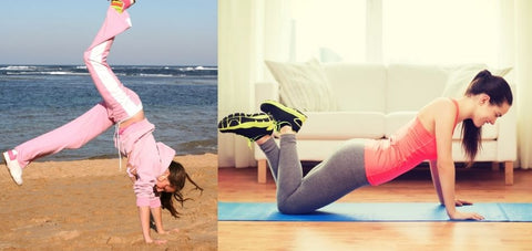 a lady doing a handstand kick up and another lady doing kneeling pushups