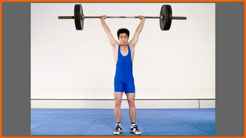 Chinese Weightlifter Lifting a Barbell overhead in Clean and Press