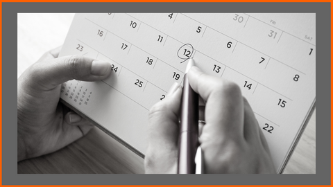 Marking on a Calendar to Schedule Exercise and Workout Days