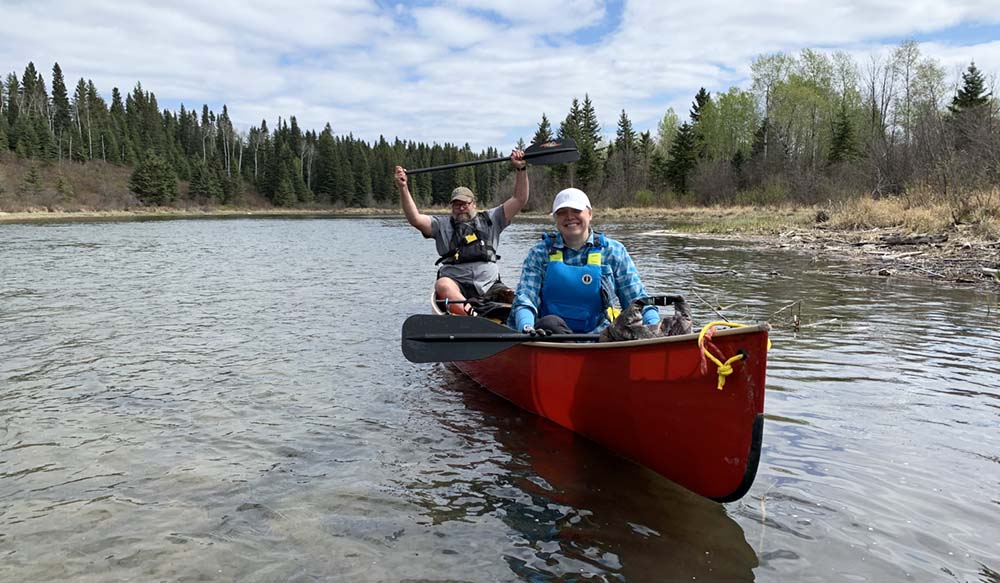 Jeff Roe and Alison Meinert in a canoe 