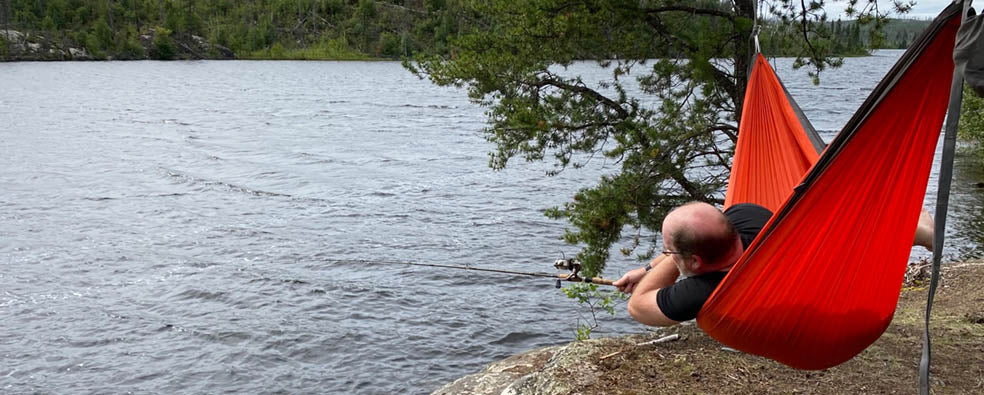 Jeff Roe fishing from his hammock 