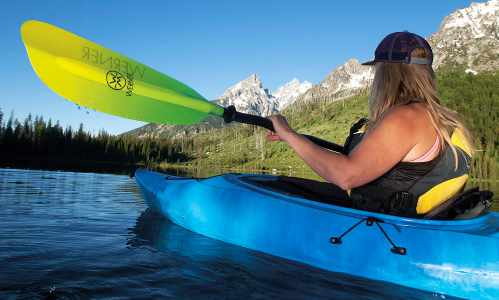 kayak paddler with low angle blade 