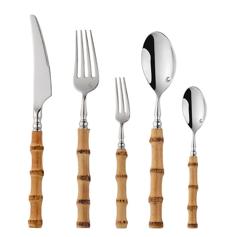 Allthingscurated Natural Bamboo Cutlery Set consisting of 1 dinner knife, 1 dinner spoon, 1 dinner fork, 1 teaspoon and 1 fruit fork. Available in 5-piece set for 1 person, or 20-piece set for 4 persons and 30-piece set for 6 persons. Made of 18/10 stainless steel and natural bamboo for handle.