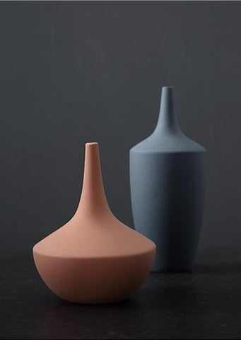 Morandi decorative vases in milky blue, blushing peach and honey milk by Allthingscurated.