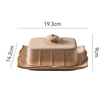 Retro-style Porcelain Butter Dish by Allthingscurated comes in 2 muted tones of Antique White and Antique Peach. A butter dish that comes with a cover with beautiful patterns, it is an ideal and practical storage for your butter. Measures 19.3cm or 7.5 inches in width, 9cm or 3.5 inches in height and 14.2cm or 5.5 inches in depth.