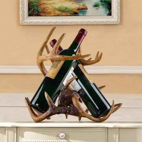 Antler Wine Bottle Holder by Allthingscurated is hand-crafted from resin and hand-painted to emulate the look of genuine antlers. Its beautiful sculptural form makes it a great gift for any occasion as well as a perfect addition for the holiday to give your winter tablescape a cabin vibe and for holding your favorite wines a the table. On its own, it’s a decorative, ornamental piece that gives a luxurious look to your mantel, tabletop or shelf. Measuring approximately 33cm or 13 inches in height, 35cm or 13.7 inches wide and a depth of 23cm or 9 inches. data-mce-fragment=