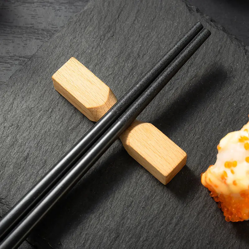 Bamboo Design Chinese Chopsticks by Allthingscurated are made from durable fiberglass polymer and heat-resistance. Stylish and sleek, the tapered end features an anti-slip design for easy and secure food picking. Enjoy 10 pairs of these high-quality chopsticks for all your Asian cuisine needs.