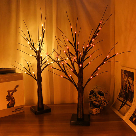 Black LED Birch Tree Light by Allthingscurated is the perfect home decor display for your beloved Halloween celebration.  Measuring 60cm or 23.4 inches in height, it comes in either 24 LED Warm White Light or 36 LED Orange Light.  The twigs are bendable and adjustable to achieve an optimal effect.