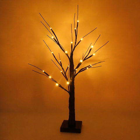 Black LED Birch Tree Light by Allthingscurated is the perfect home decor display for your beloved Halloween celebration.  Measuring 60cm or 23.4 inches in height, it comes in either 24 LED Warm White Light or 36 LED Orange Light.  The twigs are bendable and adjustable to achieve an optimal effect. This is the black tree with warm white light.