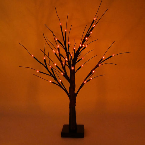 Black LED Birch Tree Light by Allthingscurated is the perfect home decor display for your beloved Halloween celebration.  Measuring 60cm or 23.4 inches in height, it comes in either 24 LED Warm White Light or 36 LED Orange Light.  The twigs are bendable and adjustable to achieve an optimal effect. This is the black tree with orange light.