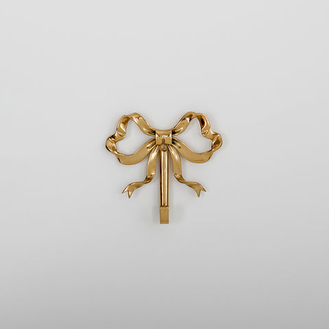 These pretty wall hooks by Allthingscurated are made of high-quality brass with a vintage gold finish.  Fashioned like a bow tied with ribbon, it’s feminine and perfect for the walk-in wardrobe or powder room. Comes in small and large size. Small hook measures 7.3cm or 2.8 inches in height and 6.5cm or 2.5 inches in width. Large hook measures 10.3cm or 4 inches in height and 9.5cm or 3.7 inches in width. Sold as individual hooks or a set of small and large hooks. This is a small hook.