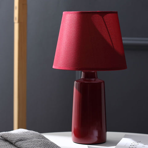 Burano Table Lamp by Allthingsucrated comes in 3 gorgeous colors in Red, Blue and Yellow. Featured here is the red lamp.