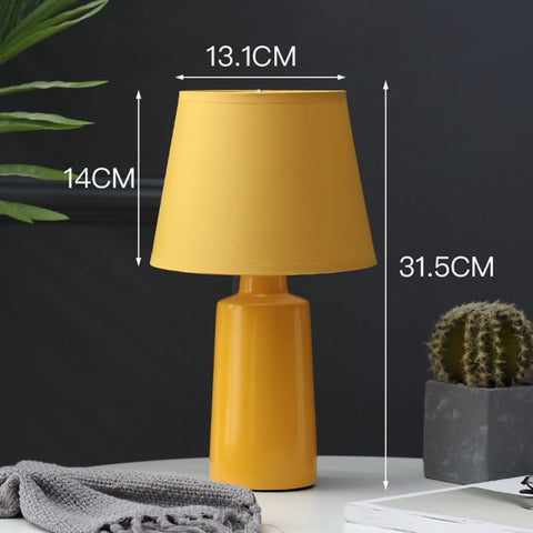 Burano Table Lamp by Allthingsucrated comes in 3 gorgeous colors in Red, Blue and Yellow.  Featured here is the yellow lamp with height measuring 31.5cm or 12.8 inches.