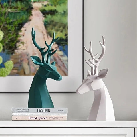 This beautiful Deer Head Bust sculpture is made of resin and comes available in 4 colors of black, white, gray and teal.  Measuring 26cm or 10 inches in height and 11.5cm or 4.5 inches in width. This figurine spots a contemporary design with sculptural form inspired by Origami. This decorative piece will add timeless elegance to your space year-round. Perfect for festive tablescapes, mantels and shelves. 