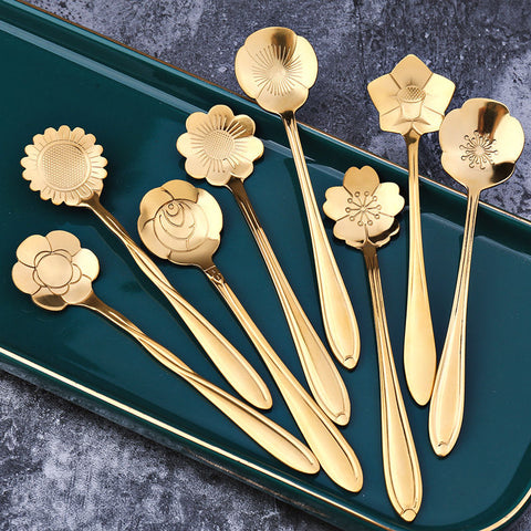 Allthingscurated Flower Teaspoon set in Gold. Set comes with 8 flower-shaped spoons in assorted designs. Length of spoon is 12.6cm or 5 inches.