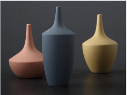 Morandi decorative vases in milky blue, blushing peach and honey milk by Allthingscurated.