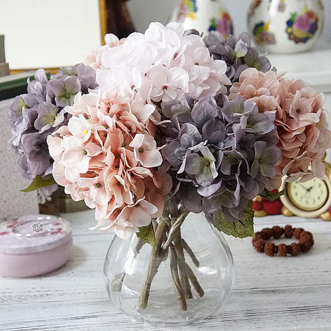 Silk Hydrangeas by Allthingscurated are made of premium quality silk that feature realistic looking flowers that are perfect for home décor and wedding venue decoration. Create a stunning display with 8 lovely colors available and add a touch of beauty and elegance to any space.