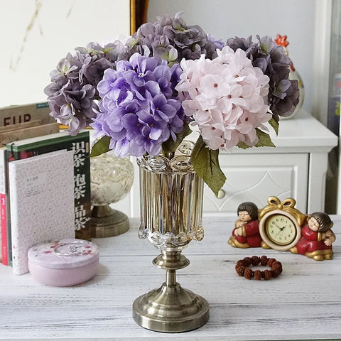 Silk Hydrangeas by Allthingscurated are made of premium quality silk that feature realistic looking flowers that are perfect for home décor and wedding venue decoration. Create a stunning display with 8 lovely colors available and add a touch of beauty and elegance to any space.