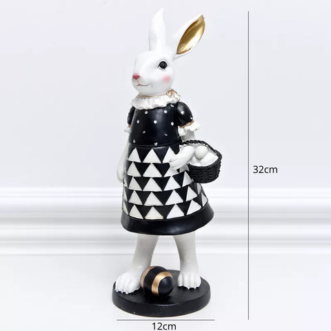 Our Regal Rabbit Family Figurines by Allthingscurated are beautifully-crafted and decorative. Made high-quality resin, these unique figurines will add a touch of elegance and whimsy to your home décor. Available in 6 designs, they are the perfect additions to your spring and Easter decorations. Featured here is Missy Rabbit.