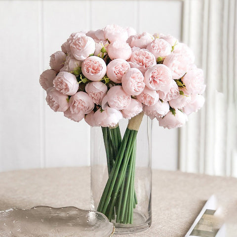 Silk Peony Bouquets by Allthingscurated are made of soft, realistic silk in 6 lovely colors to last through all seasons. Perfect for home décor or as a romantic wedding bouquet.