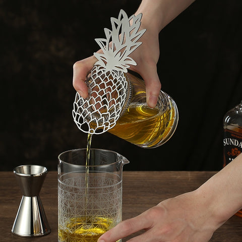 Pineapple Hawthorne Strainer by Allthingscurated.  An essential bar tool to filter out ice and any solid ingredients from your drink before serving. Measuring 18cm or 7 inches in length and 10cm or 4 inches in width. Made of stainless steel.