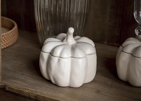 Lidded Stoneware Pumpkin Bowl by Allthingscurated features a sculptural pumpkin design.  It has a matte glaze finish in creamy white. Holds a capacity of 450mil or 15 ounce. Oozing with autumnal charm, it's the perfect serving bowl for all your thanksgiving, halloween and fall feasts.