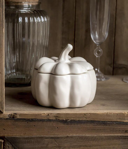 Lidded Stoneware Pumpkin Bowl by Allthingscurated features a sculptural pumpkin design.  It has a matte glaze finish in creamy white. Holds a capacity of 450mil or 15 ounce. Oozing with autumnal charm, it's the perfect serving bowl for all your thanksgiving, halloween and fall feasts.