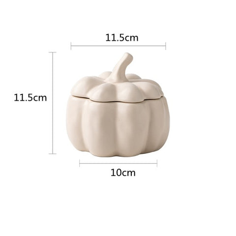 Lidded Stoneware Pumpkin Bowl by Allthingscurated features a sculptural pumpkin design.  It has a matte glaze finish in creamy white. Holds a capacity of 450mil or 15 ounce. Oozing with autumnal charm, it's the perfect serving bowl for all your thanksgiving, halloween and fall feasts.