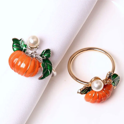 Faux Pearl Pumpkin Rings by Allthingscurated come in a set of 6 napkin rings. Each ring is crafted with exquisite detail of a pumpkin design and adorned with a faux pearl to bring a touch of sophistication. Perfect for all fall festivities, from Halloween to Thanksgiving.