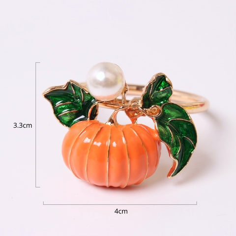 Faux Pearl Pumpkin Rings by Allthingscurated come in a set of 6 napkin rings. Each ring is crafted with exquisite detail of a pumpkin design and adorned with a faux pearl to bring a touch of sophistication. Perfect for all fall festivities, from Halloween to Thanksgiving. Measuring 4cm or 1.6 inches in width and 3.3cm or 1.3 inches in height.