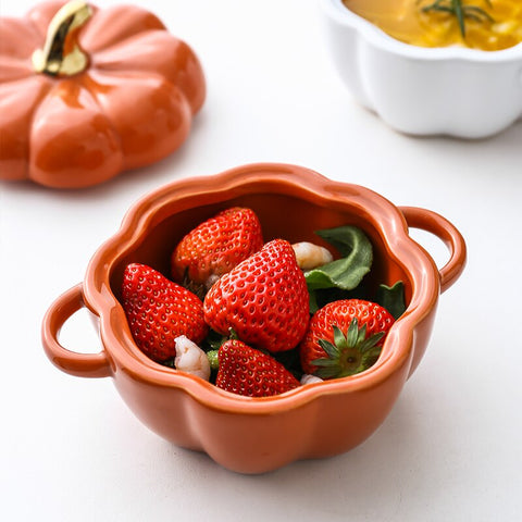 These beautiful Pumpkin Party Bowls by Allthingscurated are perfect serveware to have for a Halloween-themed or Fall-inspired dinners with friends. Made of high-quality porcelain, they are available in Off-white, Orange, Cranberry and Green. Comes with 2 handles for easy transporting and a lid with gold tip to keep food fresh and warm. Measures 16.5cm in width and 12cm in height, or 6.5 inches by 4.7 inches. Weighs 660g or 1.5 pounds with a capacity of 400ml or 13.5 fluid ounce.