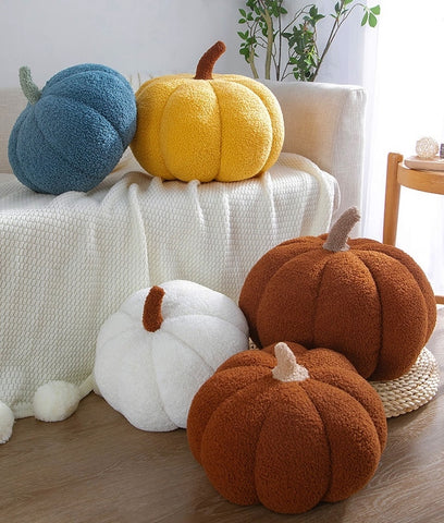 Pumpkin Pillows in teddy cotton with a tufted surface by Allthingscurated come in 3 sizes and 7 colors.  These pillows are plush and comfy, perfect for Fall and Halloween. Sizes available in 20cm, 28cm and 35cm in height or 8 inches, 11 inches and 13.7 inches in height. Colors come in white, green, blue, yellow, orange, red and brown.