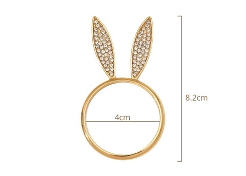 These sparkling Bunny Ear Napkin Rings (set of 6) by Allthingscurated add a cute and whimsical touch to your Easter table setting. Made of metal and encrusted with rhinestones, they come in gold, silver, and rose gold. Elevate your dining experience with these charming and sparkly napkin rings.