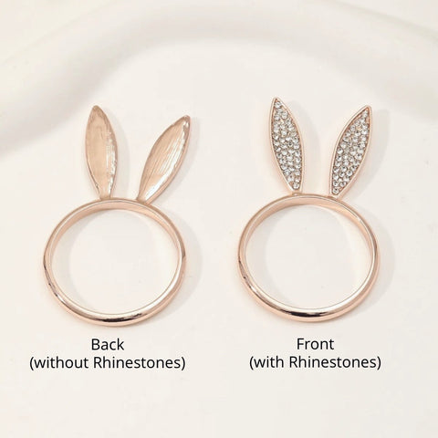 These sparkling Bunny Ear Napkin Rings (set of 6) by Allthingscurated add a cute and whimsical touch to your Easter table setting. Made of metal and encrusted with rhinestones, they come in gold, silver, and rose gold. Elevate your dining experience with these charming and sparkly napkin rings.