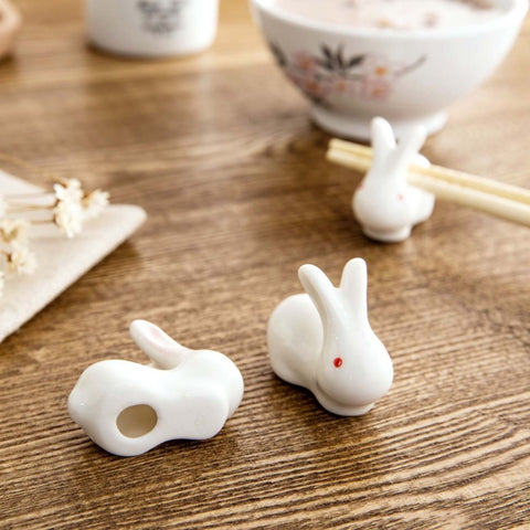 Enhance your Asian dining experience with our Ceramic Rabbit Chopstick Rests by Allthingscurated. These pieces will bring a playful edge to your table with their ability to keep your chopsticks clean and secure. Comes in a set of 3 or 6 pieces.