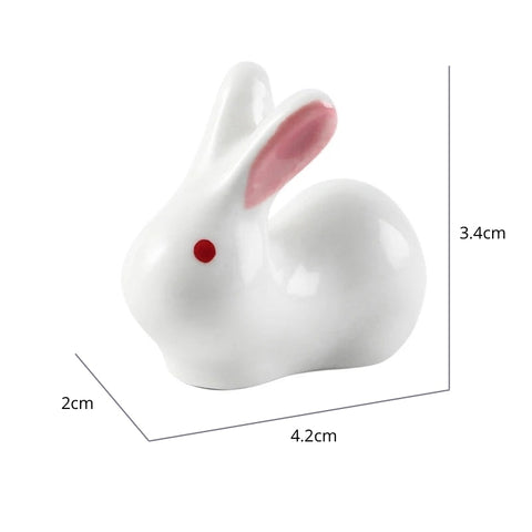 Enhance your Asian dining experience with our Ceramic Rabbit Chopstick Rests by Allthingscurated. These pieces will bring a playful edge to your table with their ability to keep your chopsticks clean and secure. Comes in a set of 3 or 6 pieces.