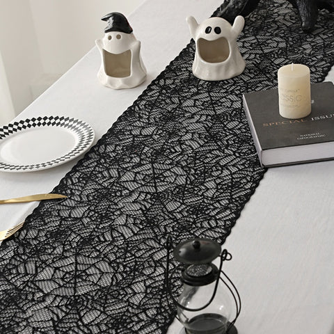 Black Lace Spider Web Table Runner by Allthingscurated. This stunning Black Spider Web Table Runner designed in elegant black lace featuring spiders and cobweb embroidery will make a bold statement for your Halloween table setting.