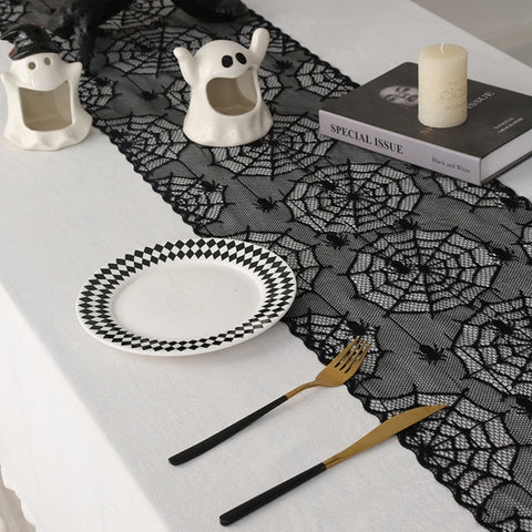 Black Lace Spider Web Table Runner by Allthingscurated. This stunning Black Spider Web Table Runner designed in elegant black lace featuring spiders and cobweb embroidery will make a bold statement for your Halloween table setting.