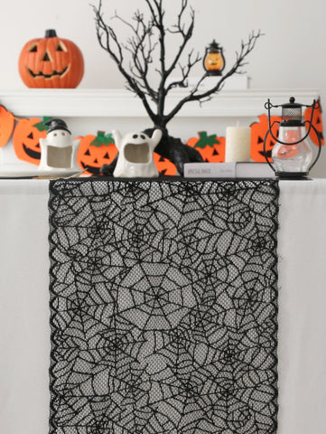 Black Lace Spider Web Table Runner by Allthingscurated. This stunning Black Spider Web Table Runner designed in elegant black lace featuring spiders and cobweb embroidery will make a bold statement for your Halloween table setting.