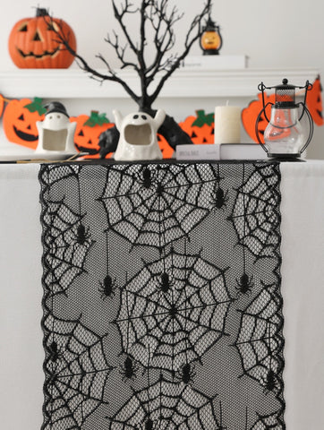 Black Lace Spider Web Table Runner by Allthingscurated. This stunning Black Spider Web Table Runner designed in elegant black lace featuring spiders and cobweb embroidery will make a bold statement for your Halloween table setting.