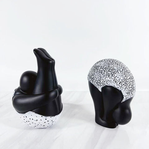 Roly-Poly-Dolly Yoga Figurines by Allthingscurated. Crafted from resin and featuring stylized volumetric figures that are characteristically rotund in shape and flexible, these artfully-designed unique pieces feature timeless black and white female figures in yoga poses.  Available in 2 styles of poses, Standing Forwarding Bend and Sitting Forward Bend.