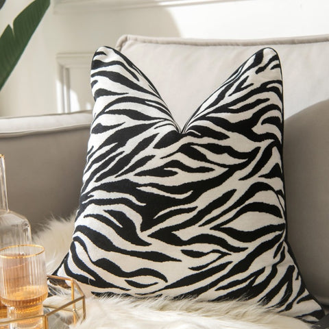 Glamorous Animal Prints Cushion Covers by Allthingscurated featured 6 animal print designs in tiger stripes, cheetah spots, zebra stripes and giraffe print. In a neutral palette and warm texture that work well with a variety of decorating styles. Timeless and chic, they are the perfect accessories to dress up with home with a wow factor. Comes in 2 square sizes of 45 by 45cm or 17.5 by 17.5 inches or 50 by 50cm or 19.5 by 19.5 inches. Featured here is our black and white zebra print.
