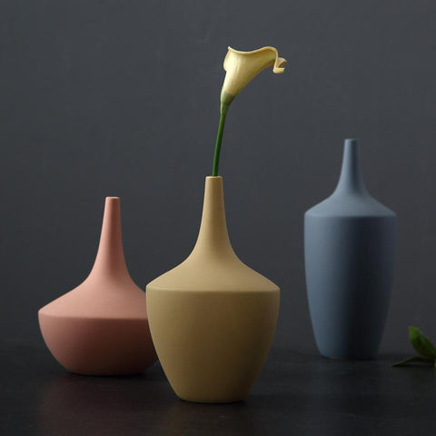 Morandi decorative vases in milky blue, blushing peach and honey milk by Allthingscurated.