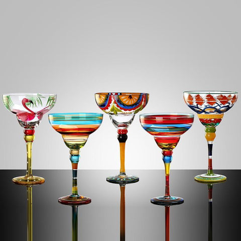 Ibiza Party Cocktail Glasses by Allthingscurated are available in 7 eclectic designs. Each cup is hand-painted and hand drawn to reflect its individual personality and creativity.