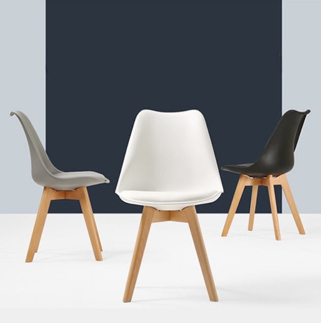 grey plastic chair with wooden legs