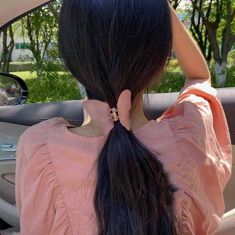 matte butterfly claw clip hairstyle